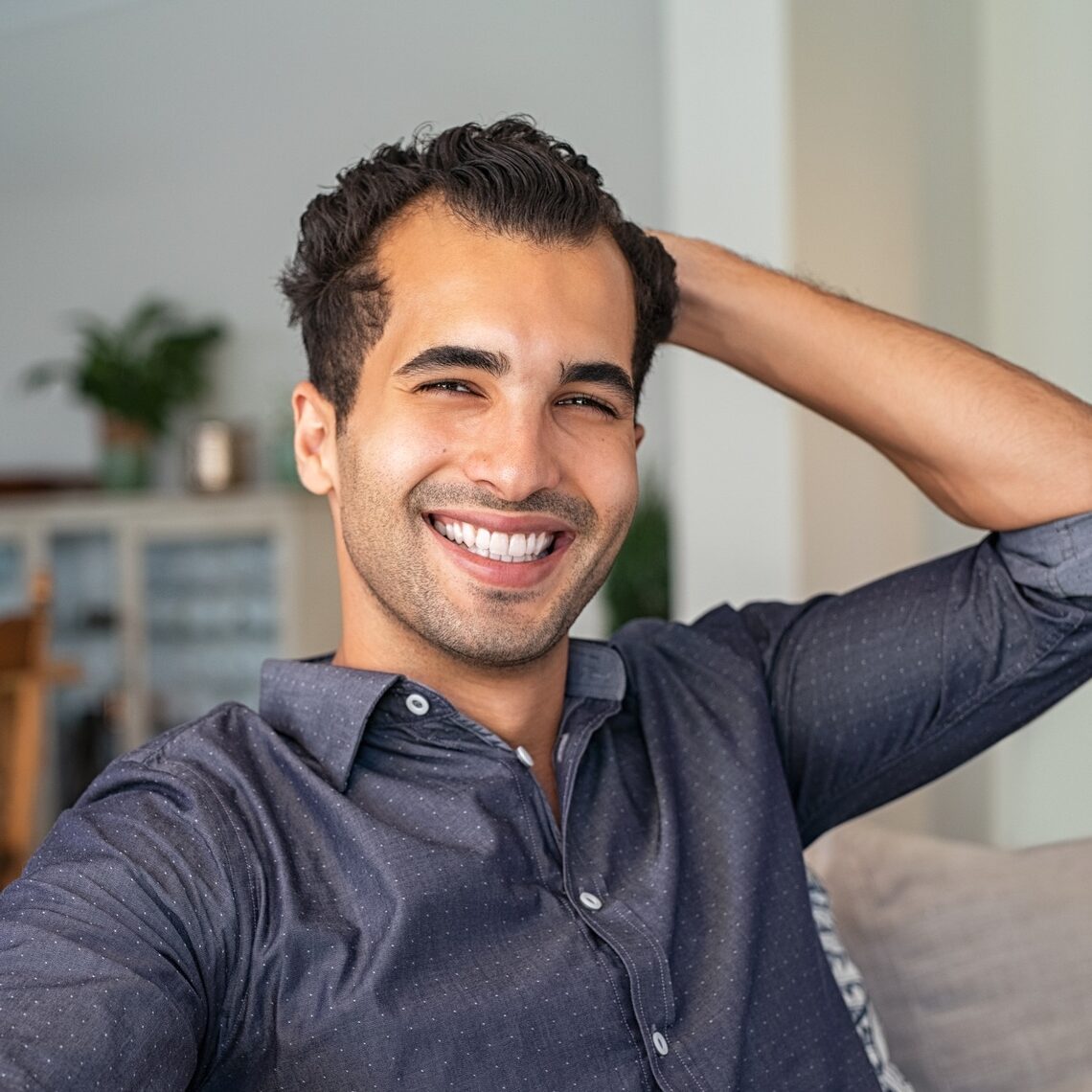 Handsome indian guy smiling